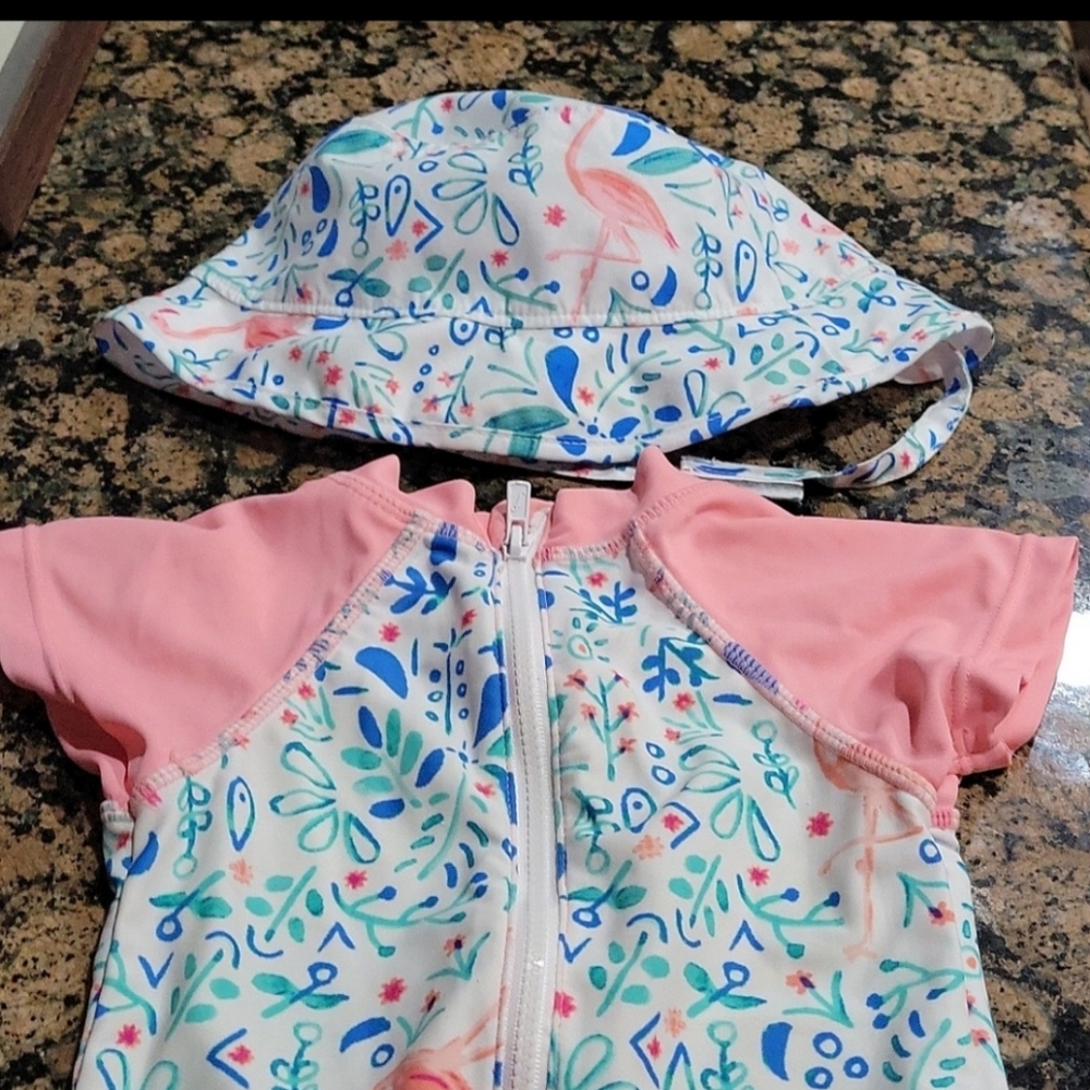 Swimsuit with hat. Rashguard style